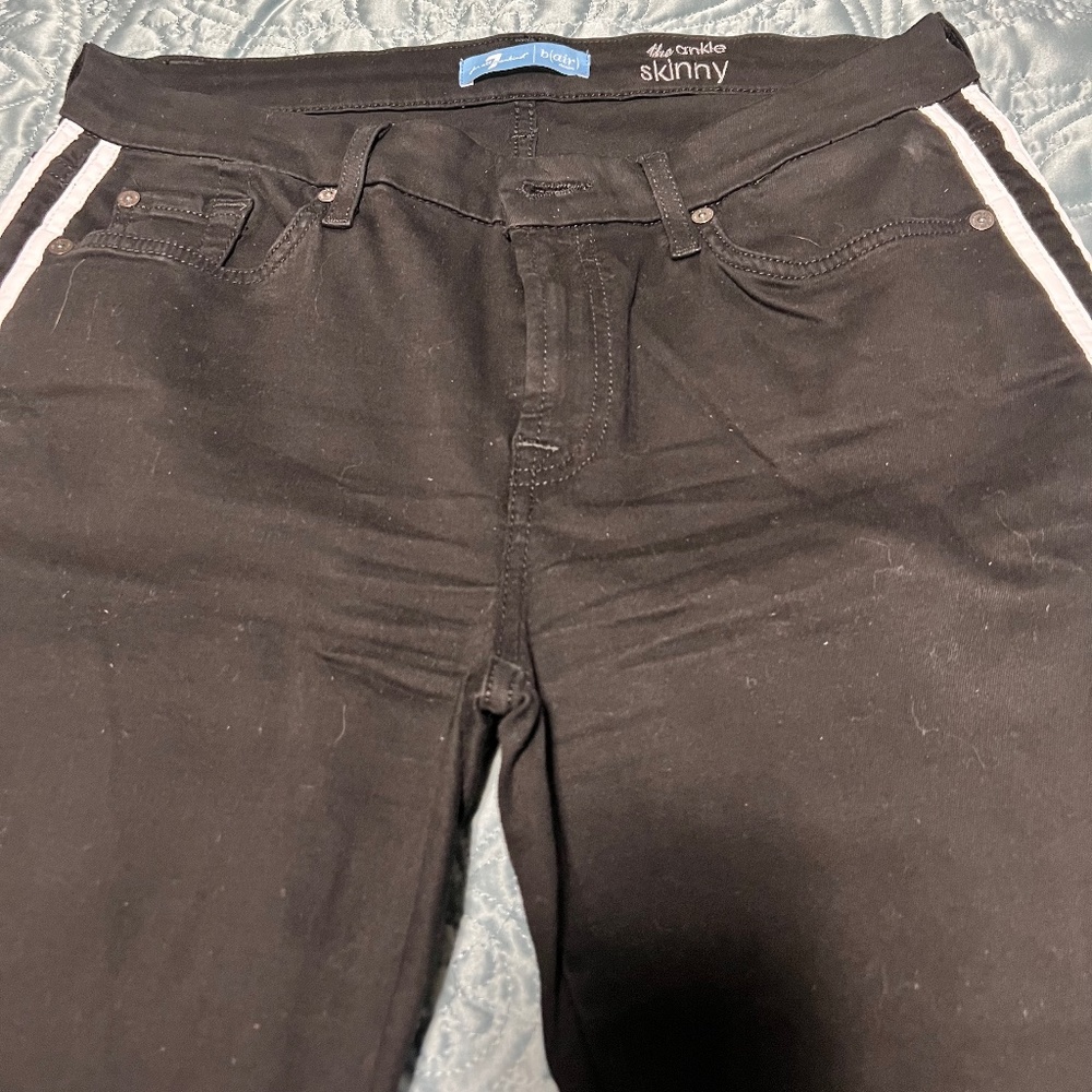 7 for all Mankind, black skinny jeans with white stripes on sides. size 32